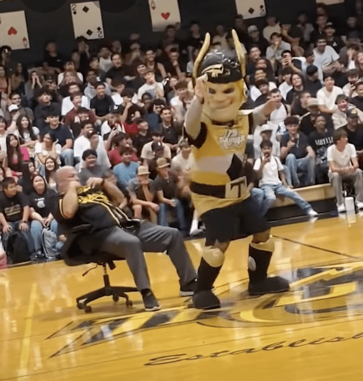 High school principal seen giving and receiving a lap dance to the school’s mascot